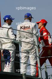 10.09.2006 Monza, Italy,  1st, Michael Schumacher (GER), Scuderia Ferrari, 248 F1, 2nd Kimi Raikkonen (FIN), Räikkönen, McLaren Mercedes, MP4-21, 3rd, Robert Kubica (POL), BMW Sauber F1 Team, F1.06 - Formula 1 World Championship, Rd 15, Italian Grand Prix, Sunday Podium