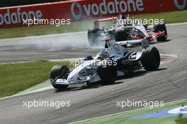 09.09.2006 Monza, Italy ** QIS, Quick Image Service ** September, Formula 1 World Championship, Rd 15, Italian Grand Prix - Every used picture is fee-liable. - EDITORS PLEASE NOTE: QIS, Quick Image Service is a special service for electronic media. QIS images are uploaded directly by the photographer moments after the image has been taken. These images will not be captioned with a text describing what is visible on the picture. Instead they will have a generic caption indicating where and when they were taken. For editors needing a correct caption, the high resolution image (fully captioned) of the same picture will appear some time later on www.xpb.cc. The QIS images will be in low resolution (800 pixels longest side) and reduced to a minimum size (format and file size) for quick transfer. More info about QIS is available at www.xpb.cc - This service is offered by xpb.cc limited - c Copyright: xpb.cc limited  