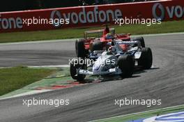 09.09.2006 Monza, Italy ** QIS, Quick Image Service ** September, Formula 1 World Championship, Rd 15, Italian Grand Prix - Every used picture is fee-liable. - EDITORS PLEASE NOTE: QIS, Quick Image Service is a special service for electronic media. QIS images are uploaded directly by the photographer moments after the image has been taken. These images will not be captioned with a text describing what is visible on the picture. Instead they will have a generic caption indicating where and when they were taken. For editors needing a correct caption, the high resolution image (fully captioned) of the same picture will appear some time later on www.xpb.cc. The QIS images will be in low resolution (800 pixels longest side) and reduced to a minimum size (format and file size) for quick transfer. More info about QIS is available at www.xpb.cc - This service is offered by xpb.cc limited - c Copyright: xpb.cc limited  