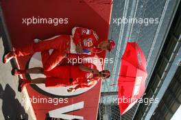 09.09.2006 Monza, Italy ** QIS, Quick Image Service ** September, Formula 1 World Championship, Rd 15, Italian Grand Prix - Every used picture is fee-liable. - EDITORS PLEASE NOTE: QIS, Quick Image Service is a special service for electronic media. QIS images are uploaded directly by the photographer moments after the image has been taken. These images will not be captioned with a text describing what is visible on the picture. Instead they will have a generic caption indicating where and when they were taken. For editors needing a correct caption, the high resolution image (fully captioned) of the same picture will appear some time later on www.xpb.cc. The QIS images will be in low resolution (800 pixels longest side) and reduced to a minimum size (format and file size) for quick transfer. More info about QIS is available at www.xpb.cc - This service is offered by xpb.cc limited - c Copyright: xpb.cc limited  