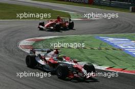 09.09.2006 Monza, Italy ** QIS, Quick Image Service ** September, Formula 1 World Championship, Rd 15, Italian Grand Prix - Every used picture is fee-liable. - EDITORS PLEASE NOTE: QIS, Quick Image Service is a special service for electronic media. QIS images are uploaded directly by the photographer moments after the image has been taken. These images will not be captioned with a text describing what is visible on the picture. Instead they will have a generic caption indicating where and when they were taken. For editors needing a correct caption, the high resolution image (fully captioned) of the same picture will appear some time later on www.xpb.cc. The QIS images will be in low resolution (800 pixels longest side) and reduced to a minimum size (format and file size) for quick transfer. More info about QIS is available at www.xpb.cc - This service is offered by xpb.cc limited - c Copyright: xpb.cc limited  