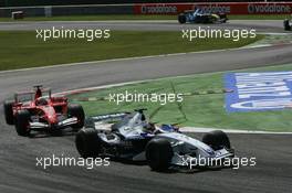 09.09.2006 Monza, Italy ** QIS, Quick Image Service ** September, Formula 1 World Championship, Rd 15, Italian Grand Prix - Every used picture is fee-liable. - EDITORS PLEASE NOTE: QIS, Quick Image Service is a special service for electronic media. QIS images are uploaded directly by the photographer moments after the image has been taken. These images will not be captioned with a text describing what is visible on the picture. Instead they will have a generic caption indicating where and when they were taken. For editors needing a correct caption, the high resolution image (fully captioned) of the same picture will appear some time later on www.xpb.cc. The QIS images will be in low resolution (800 pixels longest side) and reduced to a minimum size (format and file size) for quick transfer. More info about QIS is available at www.xpb.cc - This service is offered by xpb.cc limited - c Copyright: xpb.cc limited  