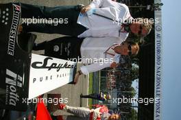 09.09.2006 Monza, Italy ** QIS, Quick Image Service ** September, Formula 1 World Championship, Rd 15, Italian Grand Prix - Every used picture is fee-liable. - EDITORS PLEASE NOTE: QIS, Quick Image Service is a special service for electronic media. QIS images are uploaded directly by the photographer moments after the image has been taken. These images will not be captioned with a text describing what is visible on the picture. Instead they will have a generic caption indicating where and when they were taken. For editors needing a correct caption, the high resolution image (fully captioned) of the same picture will appear some time later on www.xpb.cc. The QIS images will be in low resolution (800 pixels longest side) and reduced to a minimum size (format and file size) for quick transfer. More info about QIS is available at www.xpb.cc - This service is offered by xpb.cc limited - c Copyright: xpb.cc limited  