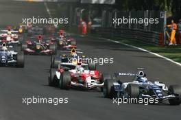 09.09.2006 Monza, Italy ** QIS, Quick Image Service ** September, Formula 1 World Championship, Rd 15, Italian Grand Prix - Every used picture is fee-liable. - EDITORS PLEASE NOTE: QIS, Quick Image Service is a special service for electronic media. QIS images are uploaded directly by the photographer moments after the image has been taken. These images will not be captioned with a text describing what is visible on the picture. Instead they will have a generic caption indicating where and when they were taken. For editors needing a correct caption, the high resolution image (fully captioned) of the same picture will appear some time later on www.xpb.cc. The QIS images will be in low resolution (800 pixels longest side) and reduced to a minimum size (format and file size) for quick transfer. More info about QIS is available at www.xpb.cc - This service is offered by xpb.cc limited - c Copyright: xpb.cc limited  