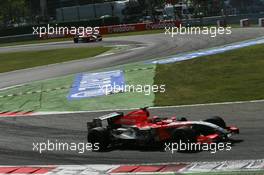 09.09.2006 Monza, Italy ** QIS, Quick Image Service ** September, Formula 1 World Championship, Rd 15, Italian Grand Prix - Every used picture is fee-liable. - EDITORS PLEASE NOTE: QIS, Quick Image Service is a special service for electronic media. QIS images are uploaded directly by the photographer moments after the image has been taken. These images will not be captioned with a text describing what is visible on the picture. Instead they will have a generic caption indicating where and when they were taken. For editors needing a correct caption, the high resolution image (fully captioned) of the same picture will appear some time later on www.xpb.cc. The QIS images will be in low resolution (800 pixels longest side) and reduced to a minimum size (format and file size) for quick transfer. More info about QIS is available at www.xpb.cc - This service is offered by xpb.cc limited - c Copyright: xpb.cc limited  