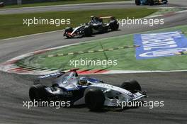 09.09.2006 Monza, Italy ** QIS, Quick Image Service ** September, Formula 1 World Championship, Rd 15, Italian Grand Prix - Every used picture is fee-liable. - EDITORS PLEASE NOTE: QIS, Quick Image Service is a special service for electronic media. QIS images are uploaded directly by the photographer moments after the image has been taken. These images will not be captioned with a text describing what is visible on the picture. Instead they will have a generic caption indicating where and when they were taken. For editors needing a correct caption, the high resolution image (fully captioned) of the same picture will appear some time later on www.xpb.cc. The QIS images will be in low resolution (800 pixels longest side) and reduced to a minimum size (format and file size) for quick transfer. More info about QIS is available at www.xpb.cc - This service is offered by xpb.cc limited - c Copyright: xpb.cc limited  