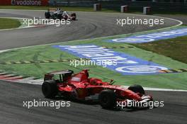 09.09.2006 Monza, Italy ** QIS, Quick Image Service ** September, Formula 1 World Championship, Rd 15, Italian Grand Prix - Every used picture is fee-liable. - EDITORS PLEASE NOTE: QIS, Quick Image Service is a special service for electronic media. QIS images are uploaded directly by the photographer moments after the image has been taken. These images will not be captioned with a text describing what is visible on the picture. Instead they will have a generic caption indicating where and when they were taken. For editors needing a correct caption, the high resolution image (fully captioned) of the same picture will appear some time later on www.xpb.cc. The QIS images will be in low resolution (800 pixels longest side) and reduced to a minimum size (format and file size) for quick transfer. More info about QIS is available at www.xpb.cc - This service is offered by xpb.cc limited - c Copyright: xpb.cc limited  