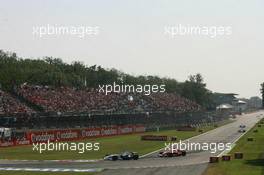 09.09.2006 Monza, Italy ** QIS, Quick Image Service ** September, Formula 1 World Championship, Rd 15, Italian Grand Prix - Every used picture is fee-liable. - EDITORS PLEASE NOTE: QIS, Quick Image Service is a special service for electronic media. QIS images are uploaded directly by the photographer moments after the image has been taken. These images will not be captioned with a text describing what is visible on the picture. Instead they will have a generic caption indicating where and when they were taken. For editors needing a correct caption, the high resolution image (fully captioned) of the same picture will appear some time later on www.xpb.cc. The QIS images will be in low resolution (800 pixels longest side) and reduced to a minimum size (format and file size) for quick transfer. More info about QIS is available at www.xpb.cc - This service is offered by xpb.cc limited - c Copyright: xpb.cc limited  