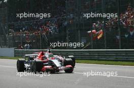 09.09.2006 Monza, Italy ** QIS, Quick Image Service ** September, Formula 1 World Championship, Rd 15, Italian Grand Prix - Every used picture is fee-liable. - EDITORS PLEASE NOTE: QIS, Quick Image Service is a special service for electronic media. QIS images are uploaded directly by the photographer moments after the image has been taken. These images will not be captioned with a text describing what is visible on the picture. Instead they will have a generic caption indicating where and when they were taken. For editors needing a correct caption, the high resolution image (fully captioned) of the same picture will appear some time later on www.xpb.cc. The QIS images will be in low resolution (800 pixels longest side) and reduced to a minimum size (format and file size) for quick transfer. More info about QIS is available at www.xpb.cc - This service is offered by xpb.cc limited - c Copyright: xpb.cc limited  