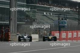 09.09.2006 Monza, Italy ** QIS, Quick Image Service ** September, Formula 1 World Championship, Rd 15, Italian Grand Prix - Every used picture is fee-liable. - EDITORS PLEASE NOTE: QIS, Quick Image Service is a special service for electronic media. QIS images are uploaded directly by the photographer moments after the image has been taken. These images will not be captioned with a text describing what is visible on the picture. Instead they will have a generic caption indicating where and when they were taken. For editors needing a correct caption, the high resolution image (fully captioned) of the same picture will appear some time later on www.xpb.cc. The QIS images will be in low resolution (800 pixels longest side) and reduced to a minimum size (format and file size) for quick transfer. More info about QIS is available at www.xpb.cc - This service is offered by xpb.cc limited - c Copyright: xpb.cc limited  