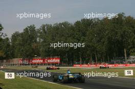 09.09.2006 Monza, Italy ** QIS, Quick Image Service ** September, Formula 1 World Championship, Rd 15, Italian Grand Prix - Every used picture is fee-liable. - EDITORS PLEASE NOTE: QIS, Quick Image Service is a special service for electronic media. QIS images are uploaded directly by the photographer moments after the image has been taken. These images will not be captioned with a text describing what is visible on the picture. Instead they will have a generic caption indicating where and when they were taken. For editors needing a correct caption, the high resolution image (fully captioned) of the same picture will appear some time later on www.xpb.cc. The QIS images will be in low resolution (800 pixels longest side) and reduced to a minimum size (format and file size) for quick transfer. More info about QIS is available at www.xpb.cc - This service is offered by xpb.cc limited - c Copyright: xpb.cc limited  