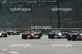 09.09.2006 Monza, Italy ** QIS, Quick Image Service ** September, Formula 1 World Championship, Rd 15, Italian Grand Prix - Every used picture is fee-liable. - EDITORS PLEASE NOTE: QIS, Quick Image Service is a special service for electronic media. QIS images are uploaded directly by the photographer moments after the image has been taken. These images will not be captioned with a text describing what is visible on the picture. Instead they will have a generic caption indicating where and when they were taken. For editors needing a correct caption, the high resolution image (fully captioned) of the same picture will appear some time later on www.xpb.cc. The QIS images will be in low resolution (800 pixels longest side) and reduced to a minimum size (format and file size) for quick transfer. More info about QIS is available at www.xpb.cc - This service is offered by xpb.cc limited - c Copyright: xpb.cc limited  