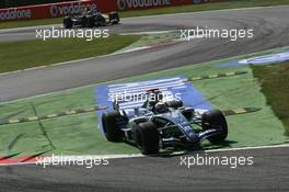 09.09.2006 Monza, Italy ** QIS, Quick Image Service ** September, Formula 1 World Championship, Rd 15, Italian Grand Prix - Every used picture is fee-liable. - EDITORS PLEASE NOTE: QIS, Quick Image Service is a special service for electronic media. QIS images are uploaded directly by the photographer moments after the image has been taken. These images will not be captioned with a text describing what is visible on the picture. Instead they will have a generic caption indicating where and when they were taken. For editors needing a correct caption, the high resolution image (fully captioned) of the same picture will appear some time later on www.xpb.cc. The QIS images will be in low resolution (800 pixels longest side) and reduced to a minimum size (format and file size) for quick transfer. More info about QIS is available at www.xpb.cc - This service is offered by xpb.cc limited - c Copyright: xpb.cc limited  