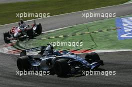 09.09.2006 Monza, Italy ** QIS, Quick Image Service ** September, Formula 1 World Championship, Rd 15, Italian Grand Prix - Every used picture is fee-liable. - EDITORS PLEASE NOTE: QIS, Quick Image Service is a special service for electronic media. QIS images are uploaded directly by the photographer moments after the image has been taken. These images will not be captioned with a text describing what is visible on the picture. Instead they will have a generic caption indicating where and when they were taken. For editors needing a correct caption, the high resolution image (fully captioned) of the same picture will appear some time later on www.xpb.cc. The QIS images will be in low resolution (800 pixels longest side) and reduced to a minimum size (format and file size) for quick transfer. More info about QIS is available at www.xpb.cc - This service is offered by xpb.cc limited - c Copyright: xpb.cc limited  