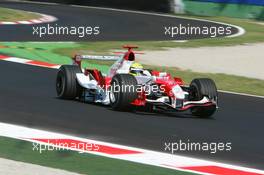 09.09.2006 Monza, Italy ** QIS, Quick Image Service ** September, Formula 1 World Championship, Rd 15, Italian Grand Prix - Every used picture is fee-liable. - EDITORS PLEASE NOTE: QIS, Quick Image Service is a special service for electronic media. QIS images are uploaded directly by the photographer moments after the image has been taken. These images will not be captioned with a text describing what is visible on the picture. Instead they will have a generic caption indicating where and when they were taken. For editors needing a correct caption, the high resolution image (fully captioned) of the same picture will appear some time later on www.xpb.cc. The QIS images will be in low resolution (800 pixels longest side) and reduced to a minimum size (format and file size) for quick transfer. More info about QIS is available at www.xpb.cc - This service is offered by xpb.cc limited - c Copyright: xpb.cc limited  