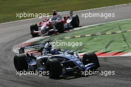 10.09.2006 Monza, Italy,  Nico Rosberg (GER), WilliamsF1 Team, Jarno Trulli (ITA), Toyota Racing - Formula 1 World Championship, Rd 15, Italian Grand Prix, Sunday Race