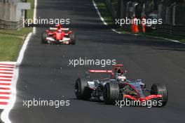 10.09.2006 Monza, Italy,  Kimi Raikkonen (FIN), Räikkönen, McLaren Mercedes, Michael Schumacher (GER), Scuderia Ferrari - Formula 1 World Championship, Rd 15, Italian Grand Prix, Sunday Race