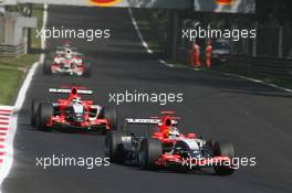 10.09.2006 Monza, Italy,  Tiago Monteiro (POR), Spyker MF1 Racing, Toyota M16 and Christijan Albers (NED), Spyker MF1 Racing, Toyota M16  - Formula 1 World Championship, Rd 15, Italian Grand Prix, Sunday Race