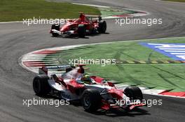 10.09.2006 Monza, Italy,  Ralf Schumacher (GER), Toyota Racing and Michael Schumacher (GER), Scuderia Ferrari - Formula 1 World Championship, Rd 15, Italian Grand Prix, Sunday Race