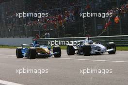 10.09.2006 Monza, Italy,  Nick Heidfeld (GER), BMW Sauber F1 Team, F1.06 and Fernando Alonso (ESP), Renault F1 Team, R26 - Formula 1 World Championship, Rd 15, Italian Grand Prix, Sunday Race