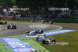 10.09.2006 Monza, Italy,  Fernando Alonso (ESP), Renault F1 Team, R26, cuts the chicane at turn 1 - Formula 1 World Championship, Rd 15, Italian Grand Prix, Sunday Race