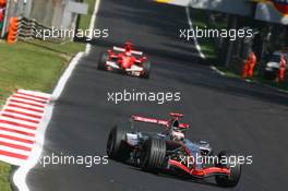 10.09.2006 Monza, Italy,  Kimi Raikkonen (FIN), Räikkönen, McLaren Mercedes, MP4-21 and Michael Schumacher (GER), Scuderia Ferrari, 248 F1 - Formula 1 World Championship, Rd 15, Italian Grand Prix, Sunday Race