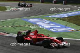 10.09.2006 Monza, Italy,  Michael Schumacher (GER), Scuderia Ferrari and Kimi Raikkonen (FIN), Räikkönen, McLaren Mercedes - Formula 1 World Championship, Rd 15, Italian Grand Prix, Sunday Race