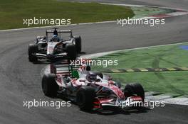 10.09.2006 Monza, Italy,  Takuma Sato (JPN), Super Aguri F1 and Jenson Button (GBR), Honda Racing F1 Team - Formula 1 World Championship, Rd 15, Italian Grand Prix, Sunday Race