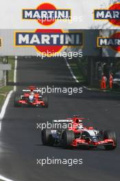 10.09.2006 Monza, Italy,  Christijan Albers (NED), Spyker MF1 Racing, Toyota M16 and Tiago Monteiro (POR), Spyker MF1 Racing, Toyota M16  - Formula 1 World Championship, Rd 15, Italian Grand Prix, Sunday Race