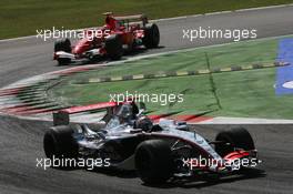 10.09.2006 Monza, Italy,  Kimi Raikkonen (FIN), Räikkönen, McLaren Mercedes, Michael Schumacher (GER), Scuderia Ferrari - Formula 1 World Championship, Rd 15, Italian Grand Prix, Sunday Race