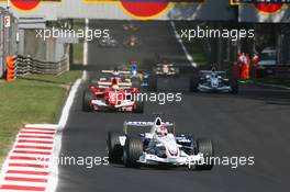 10.09.2006 Monza, Italy,  Robert Kubica (POL), BMW Sauber F1 Team, F1.06 and Felipe Massa (BRA), Scuderia Ferrari, 248 F1 - Formula 1 World Championship, Rd 15, Italian Grand Prix, Sunday Race