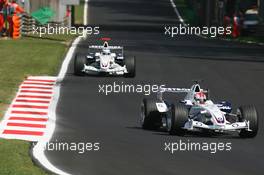 10.09.2006 Monza, Italy,  Robert Kubica (POL), BMW Sauber F1 Team, F1.06 and Nick Heidfeld (GER), BMW Sauber F1 Team, F1.06 - Formula 1 World Championship, Rd 15, Italian Grand Prix, Sunday Race