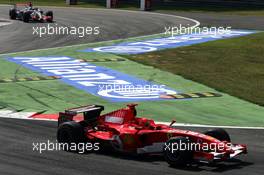 10.09.2006 Monza, Italy,  Michael Schumacher (GER), Scuderia Ferrari and Kimi Raikkonen (FIN), Räikkönen, McLaren Mercedes - Formula 1 World Championship, Rd 15, Italian Grand Prix, Sunday Race