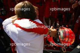 10.09.2006 Monza, Italy,  Luca di Montezemolo (ITA), Scuderia Ferrari, Fiat President, Chairman & Managing Director and Michael Schumacher (GER), Scuderia Ferrari  - Formula 1 World Championship, Rd 15, Italian Grand Prix, Sunday Race