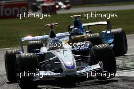 10.09.2006 Monza, Italy,  Nick Heidfeld (GER), BMW Sauber F1 Team, Fernando Alonso (ESP), Renault F1 Team - Formula 1 World Championship, Rd 15, Italian Grand Prix, Sunday Race