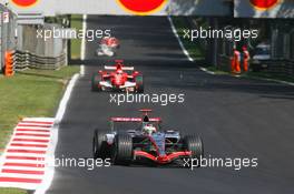 10.09.2006 Monza, Italy,  Kimi Raikkonen (FIN), Räikkönen, McLaren Mercedes, MP4-21 and Michael Schumacher (GER), Scuderia Ferrari, 248 F1 - Formula 1 World Championship, Rd 15, Italian Grand Prix, Sunday Race