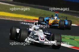 10.09.2006 Monza, Italy,  Nick Heidfeld (GER), BMW Sauber F1 Team, F1.06 and Fernando Alonso (ESP), Renault F1 Team, R26 - Formula 1 World Championship, Rd 15, Italian Grand Prix, Sunday Race