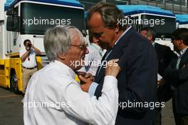 09.09.2006 Monza, Italy,  Bernie Ecclestone (GBR) and Angelo Codignoni, Eurosport president and CEO - Formula 1 World Championship, Rd 15, Italian Grand Prix, Saturday