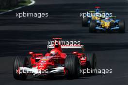 09.09.2006 Monza, Italy,  Michael Schumacher (GER), Scuderia Ferrari, Fernando Alonso (ESP), Renault F1 Team, Giancarlo Fisichella (ITA), Renault F1 Team - Formula 1 World Championship, Rd 15, Italian Grand Prix, Saturday Qualifying