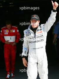 09.09.2006 Monza, Italy,  Kimi Raikkonen (FIN), Räikkönen, McLaren Mercedes, Michael Schumacher (GER), Scuderia Ferrari  - Formula 1 World Championship, Rd 15, Italian Grand Prix, Saturday Qualifying