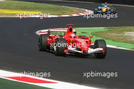 09.09.2006 Monza, Italy,  Michael Schumacher (GER), Scuderia Ferrari, 248 F1, Fernando Alonso (ESP), Renault F1 Team, R26 - Formula 1 World Championship, Rd 15, Italian Grand Prix, Saturday Qualifying