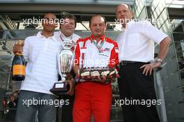 10.09.2006 Monza, Italy,  Lewis Hamilton (GBR) Winner 2006 GP2 Championship, with Norbert Haug (GER), Mercedes, Motorsport chief and Ron Dennis (GBR), McLaren, Team Principal, Chairman - Formula 1 World Championship, Rd 15, Italian Grand Prix, Sunday