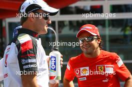 10.09.2006 Monza, Italy,  Rubens Barrichello (BRA), Honda Racing F1 Team and Felipe Massa (BRA), Scuderia Ferrari - Formula 1 World Championship, Rd 15, Italian Grand Prix, Sunday