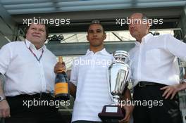 10.09.2006 Monza, Italy,  Lewis Hamilton (GBR) Winner 2006 GP2 Championship, with Norbert Haug (GER), Mercedes, Motorsport chief and Ron Dennis (GBR), McLaren, Team Principal, Chairman - Formula 1 World Championship, Rd 15, Italian Grand Prix, Sunday