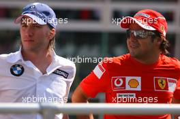 10.09.2006 Monza, Italy,  Nick Heidfeld (GER), BMW Sauber F1 Team and Felipe Massa (BRA), Scuderia Ferrari - Formula 1 World Championship, Rd 15, Italian Grand Prix, Sunday