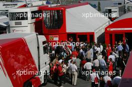 10.09.2006 Monza, Italy,  People waiting in front of Ferrari Hospitality - Formula 1 World Championship, Rd 15, Italian Grand Prix, Sunday