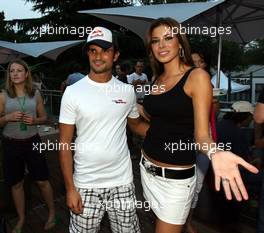 07.09.2006 Monza, Italy,  Vitantonio Liuzzi (ITA), Scuderia Toro Rosso, with a girl - Formula 1 World Championship, Rd 15, Italian Grand Prix, Thursday