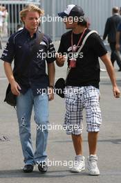 07.09.2006 Monza, Italy,  Nico Rosberg (GER), WilliamsF1 Team and Vitantonio Liuzzi (ITA), Scuderia Toro Rosso - Formula 1 World Championship, Rd 15, Italian Grand Prix, Thursday