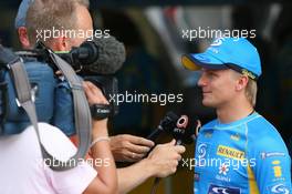 07.09.2006 Monza, Italy,  Heikki Kovalainen (FIN), Test Driver, Renault F1 Team is interviewed by TV - Formula 1 World Championship, Rd 15, Italian Grand Prix, Thursday