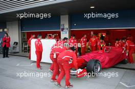 10.01.2006 Jerez, Spain,  Michael Schumacher (GER), Scuderia Ferrari, car is taken back to the pits after stopped in the gravel - Formula One Testing